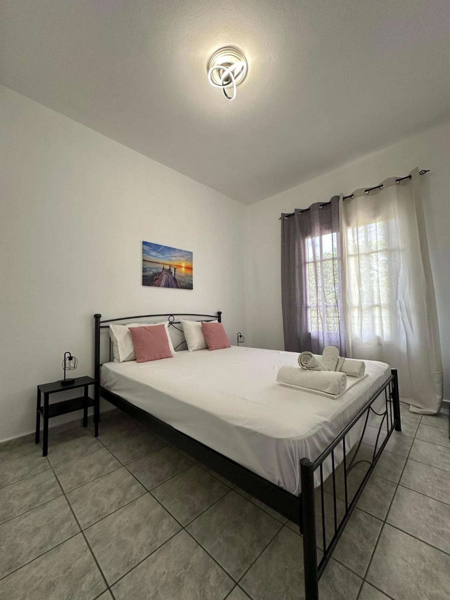 Ionian Luxury Apartments Перама Экстерьер фото